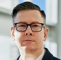 Alexander Hughes, CEO de una compañía de trading de criptomonedas, retrato